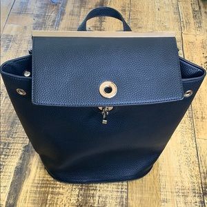 Black and gold adjustable backpack